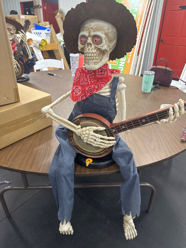 SKELETON PLAYING BANJO